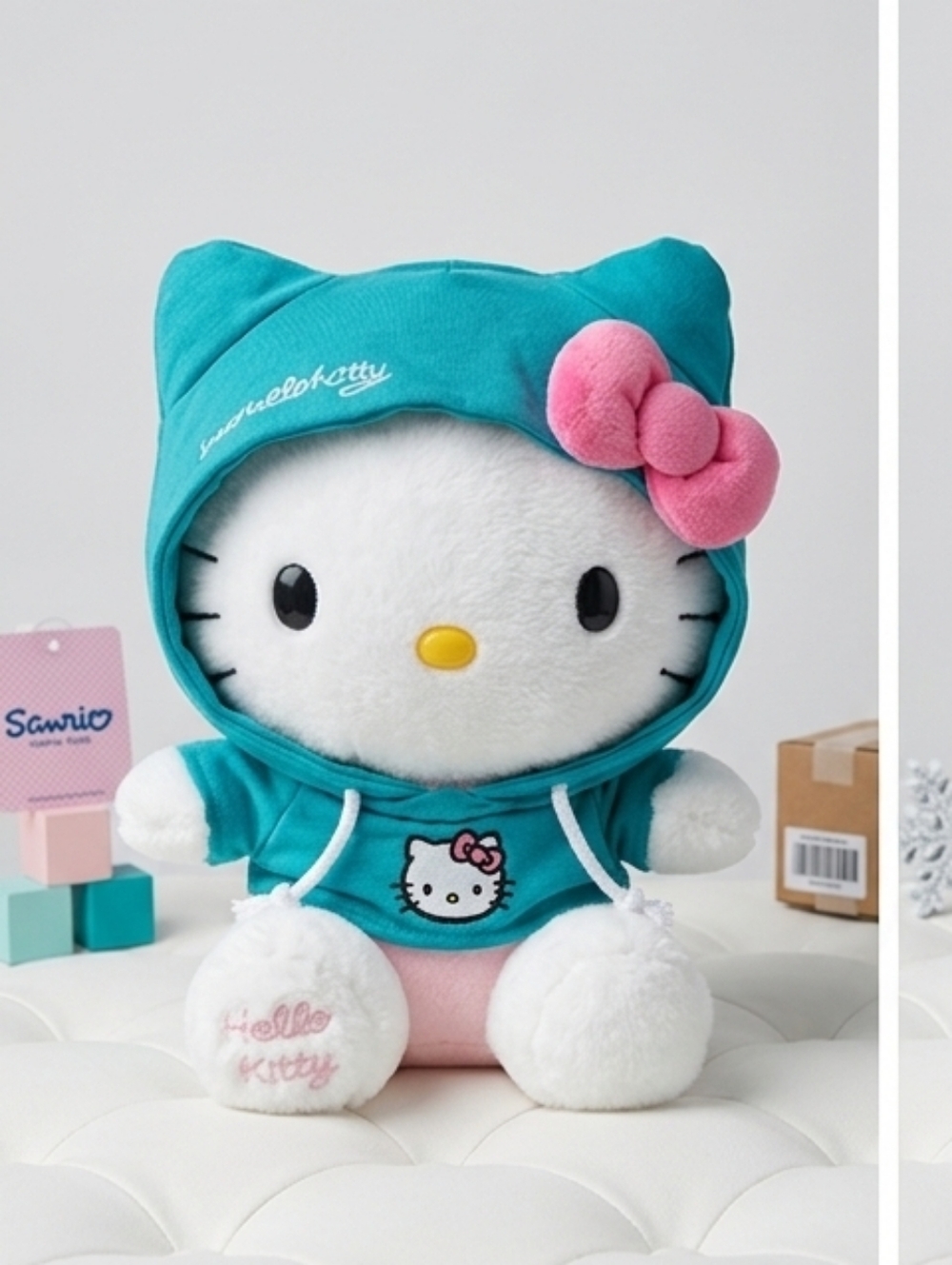 Sanrio Hello Kitty Plush in Teal with Pink Bow